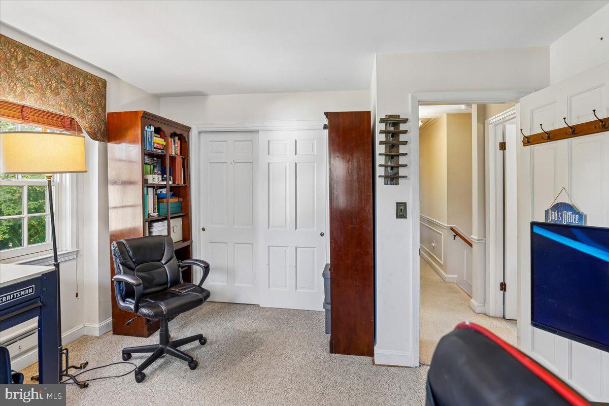7918 Ruxway Road Towson, MD 21204 - Photo 28 of 36 a view of a workspace with furniture and a window