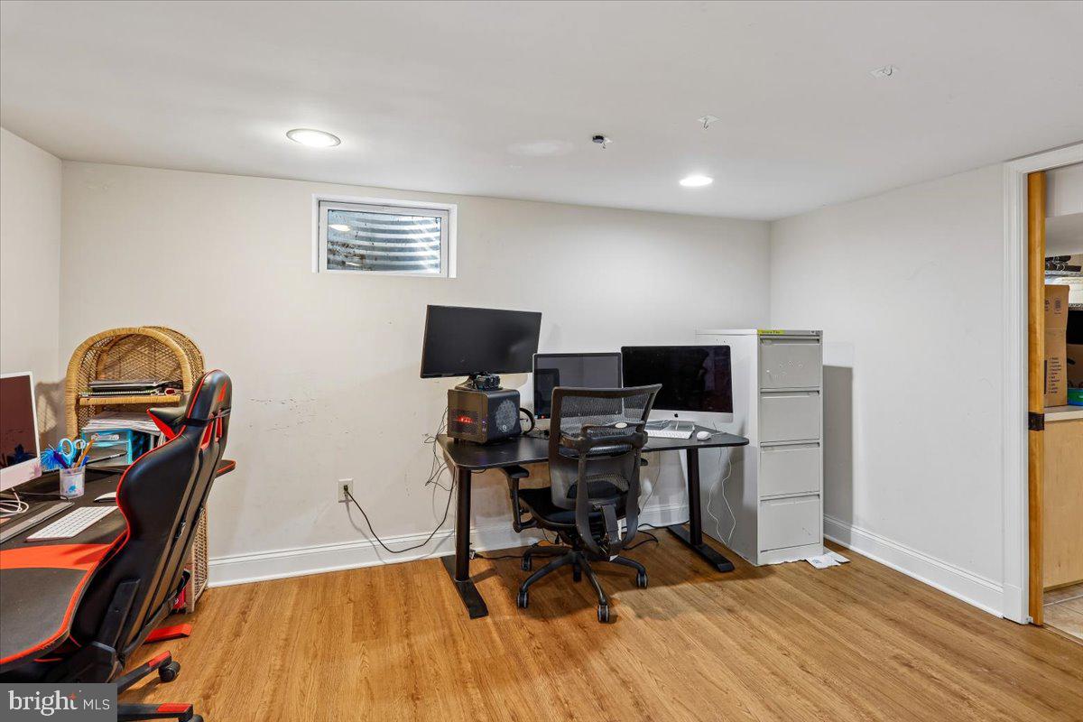 7918 Ruxway Road Towson, MD 21204 - Photo 32 of 36 a view of a workspace with furniture and a window