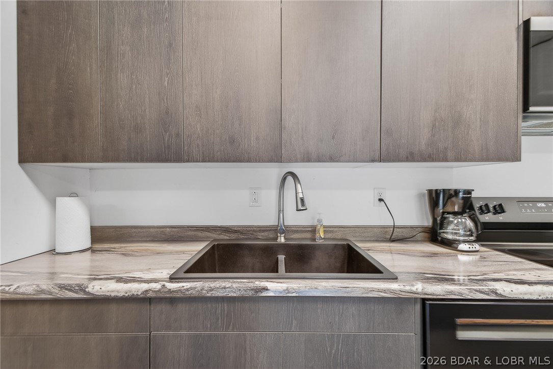27444 Golden Beach Road Barnett, MO 65011 - Photo 6 of 42 Stylish counter top & sink