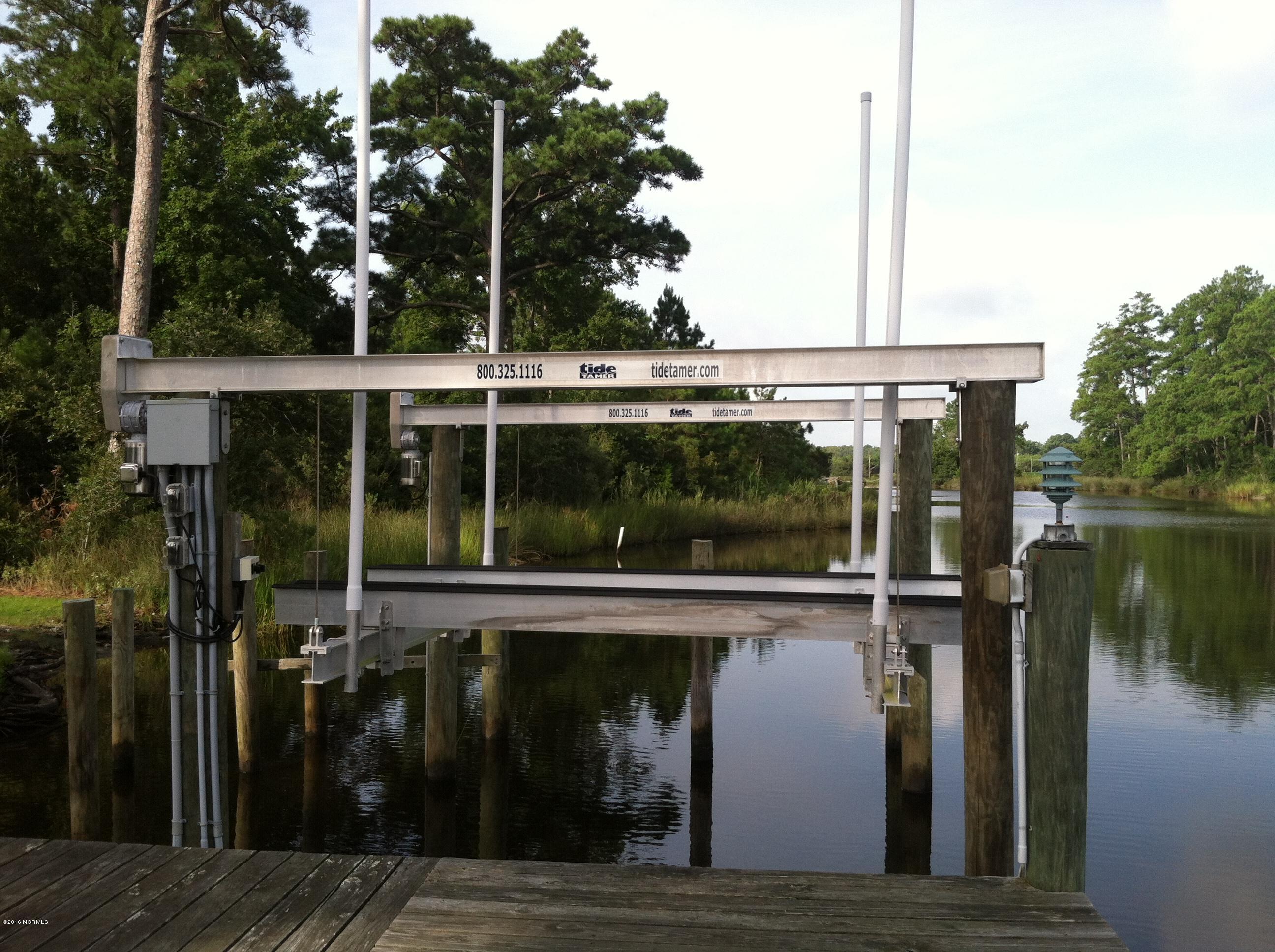 7381 Florence Road Merritt, NC 28556 - Photo 4 of 33 10K lb lift and a Jet Ski. Dock w/Water and Electric