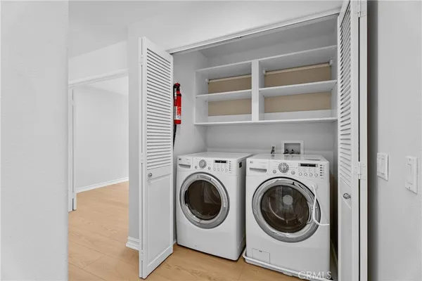a utility room with washing machine