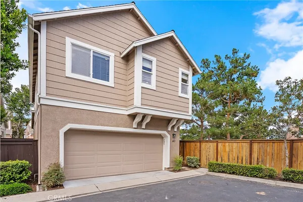 a front view of a house with a garage