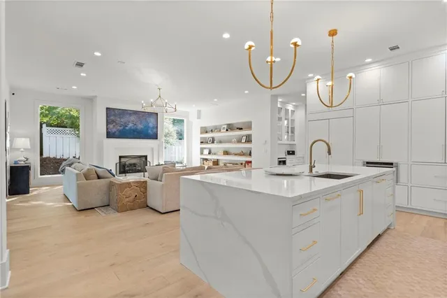 a view of a porch with wooden floor and windows