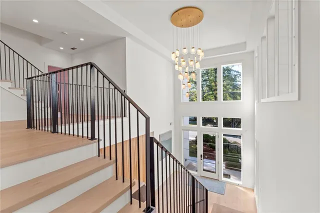 a bathroom with double sink and a mirror