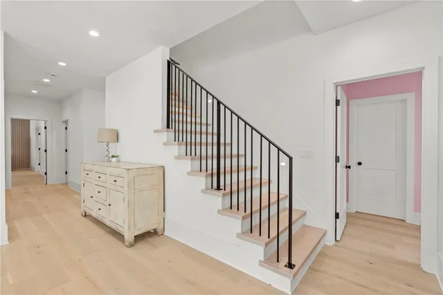 a white bath tub sitting in a bathroom