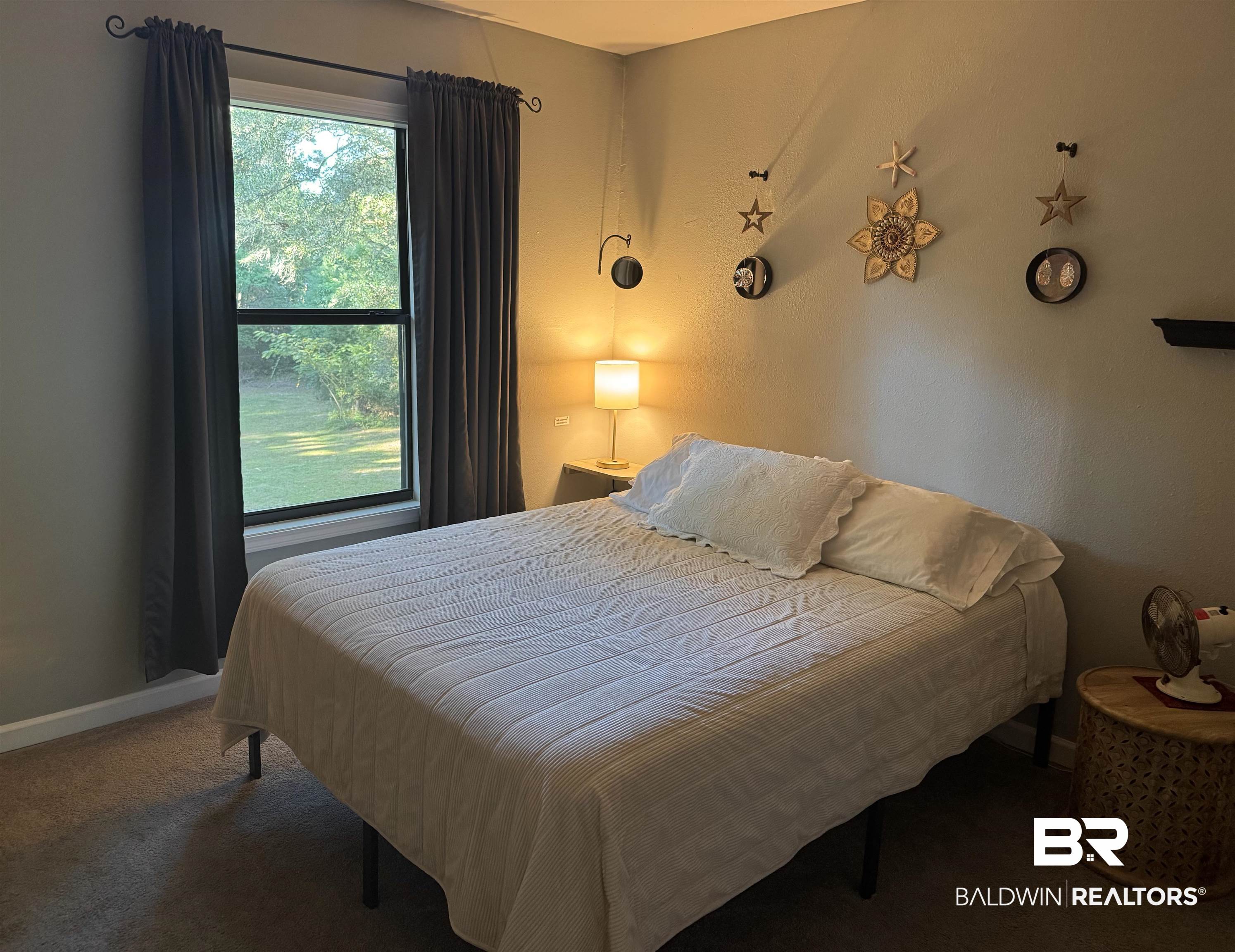 1302 Oak Street Daphne, AL 36526 - Photo 19 of 34 Carpeted bedroom featuring baseboards