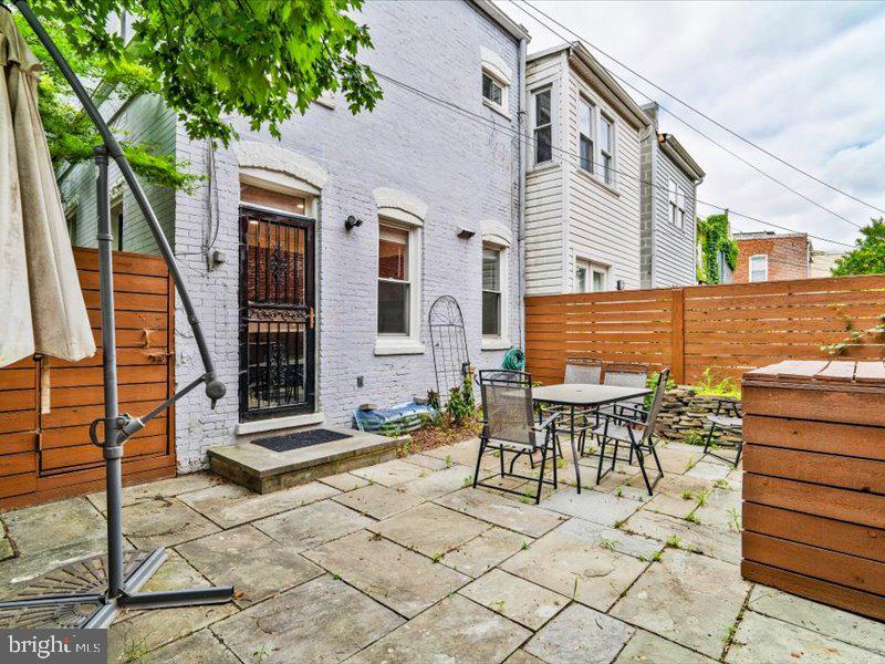 1200 D Street Northeast Washington, DC 20002 - Photo 43 of 47 Charming patio oasis for relaxation.