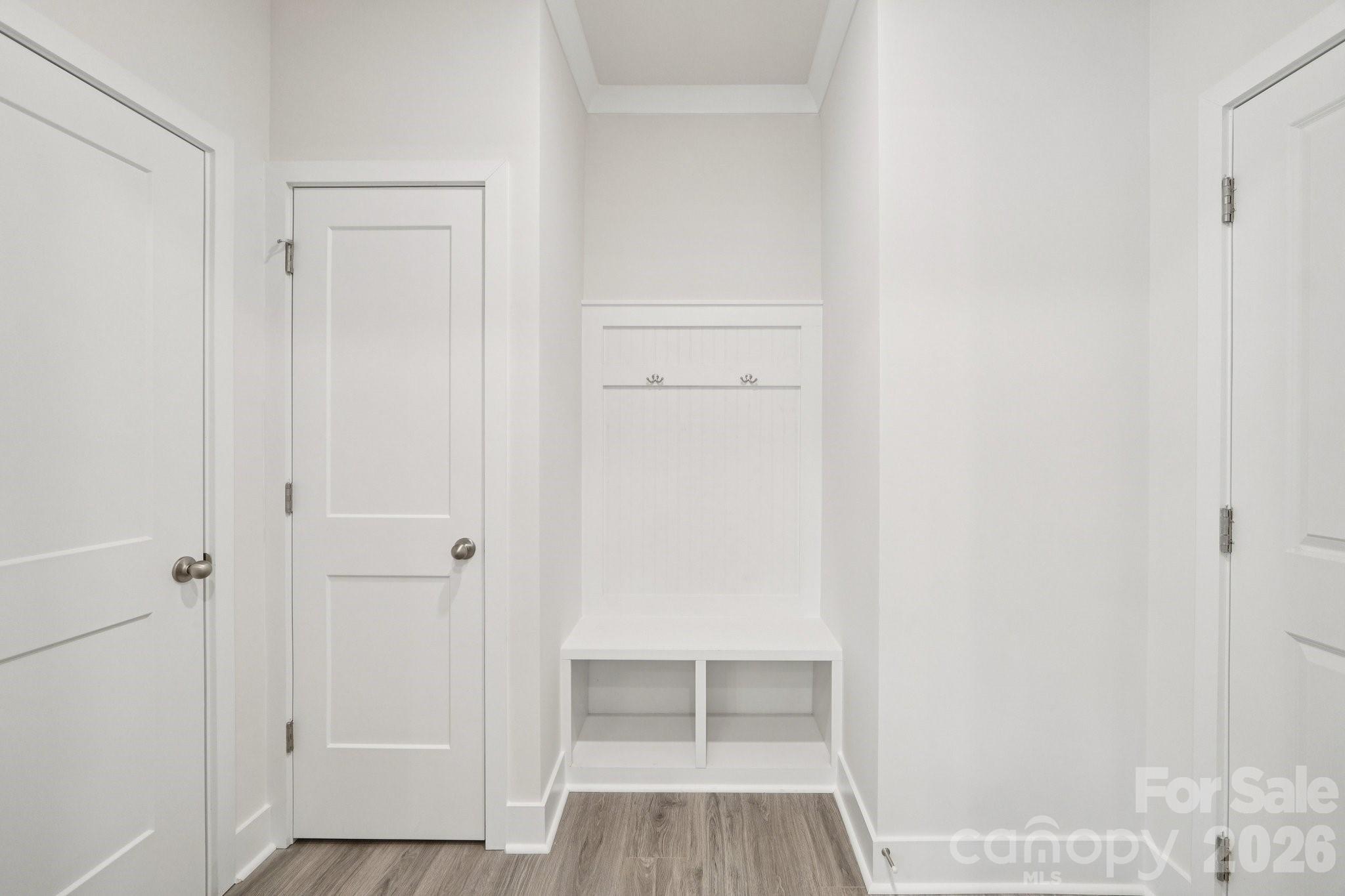 7685 Bainbridge Road Sherrills Ford, NC 28673 - Photo 16 of 33 a view of walk in closet with wooden floor