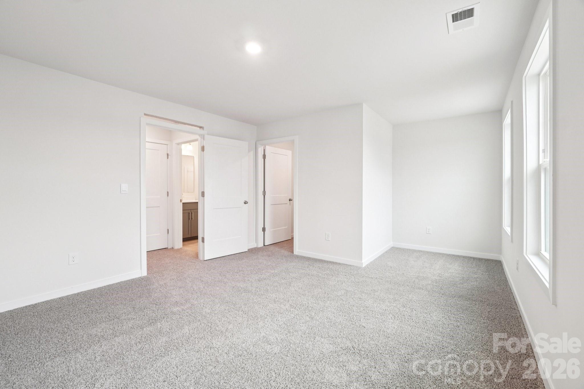 7685 Bainbridge Road Sherrills Ford, NC 28673 - Photo 32 of 33 an empty room with a natural light