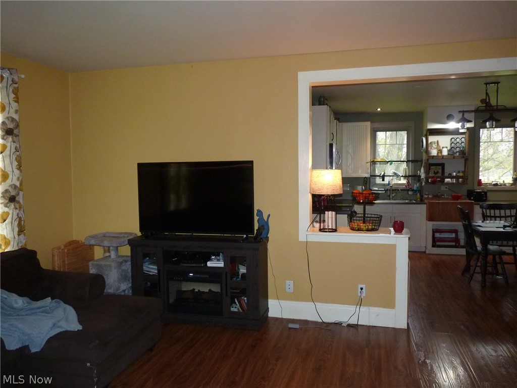 3119 South Leavitt Road Southwest Warren, OH 44481 - Photo 16 of 50 Living room featuring dark hardwood / wood-style flooring