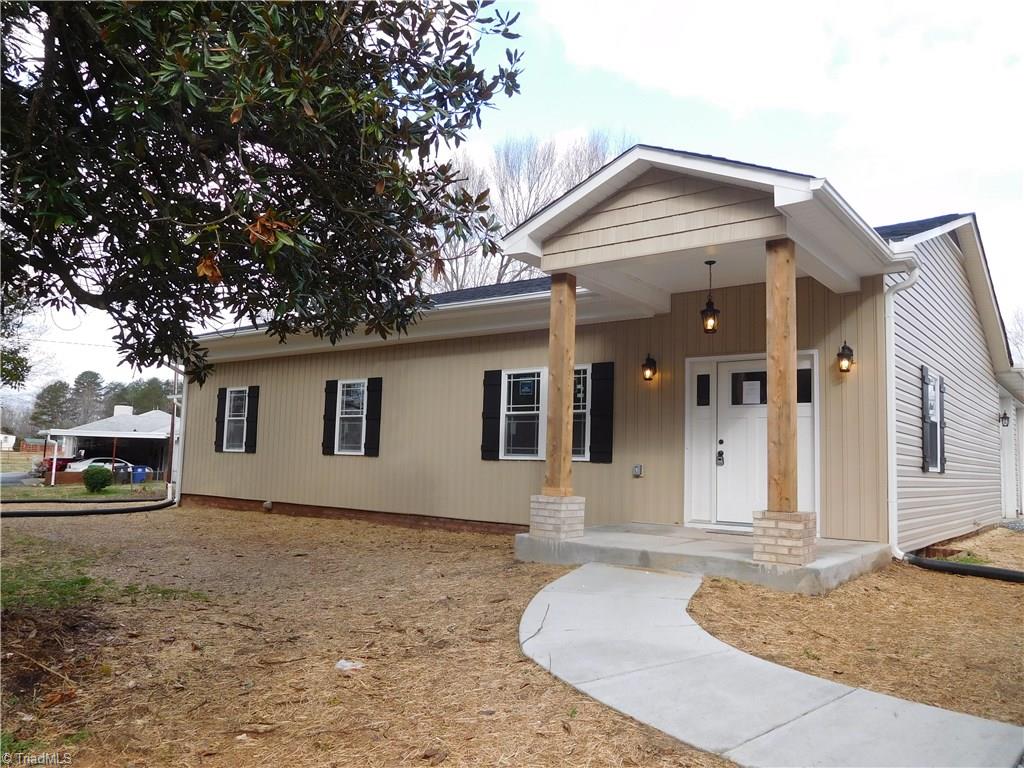 TOTAL TRANSFORMATION.  This home is like New & Very Spacious. New Cute Covered Front Porch & concrete sidewalk.