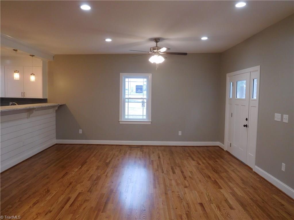 The Living room is huge and has a ton of natural light.  Hardwood floors in LR, DR, Kitchen, Hall w/walk-in Laundry room & closet plus long Hallway leading to BR's.