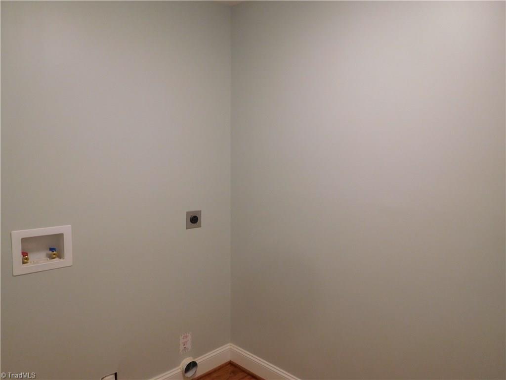 261 Jones Road Winston-Salem, NC 27107 - Photo 21 of 28 Walk-in Laundry room off of hallway with garage access.