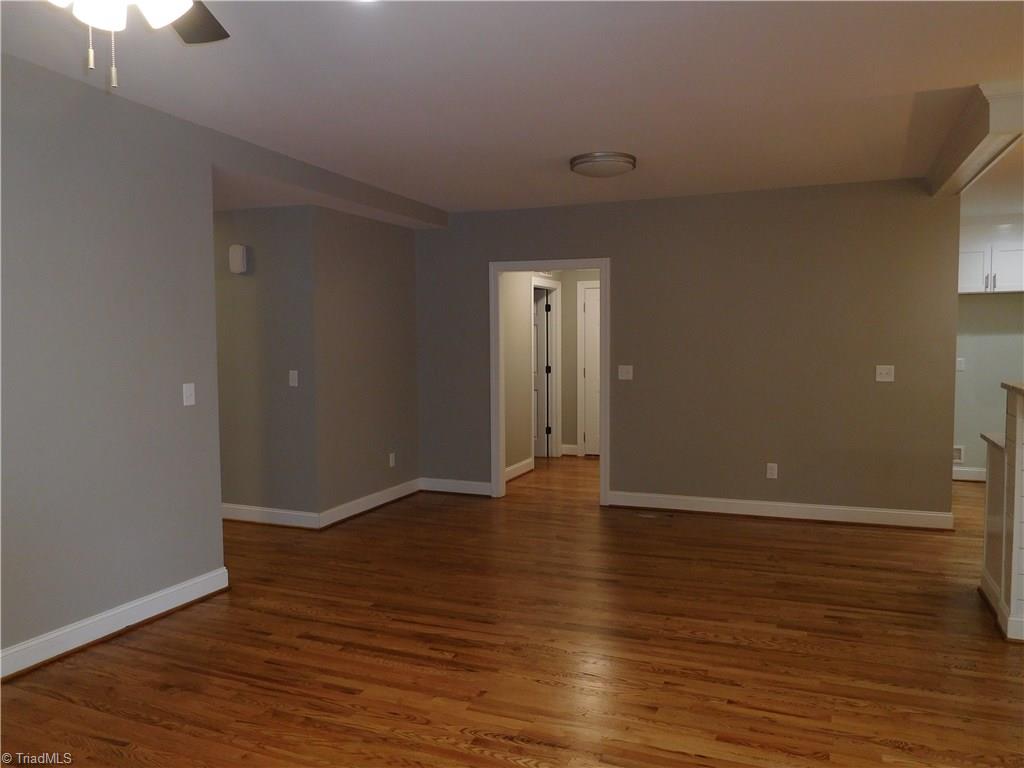 Dining Area.  Hall behind leads to door to garage, 8'x5' walk-in Laundry room and large coat closet.