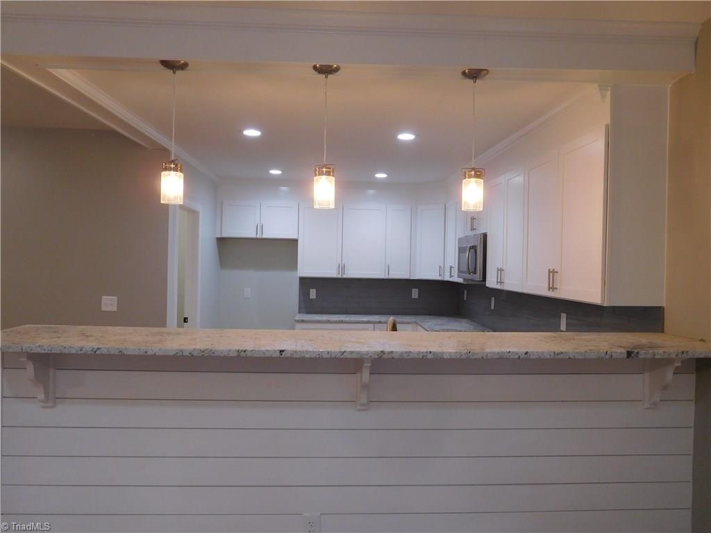 Kitchen:  Notice the use of shiplap on the Peninsula.