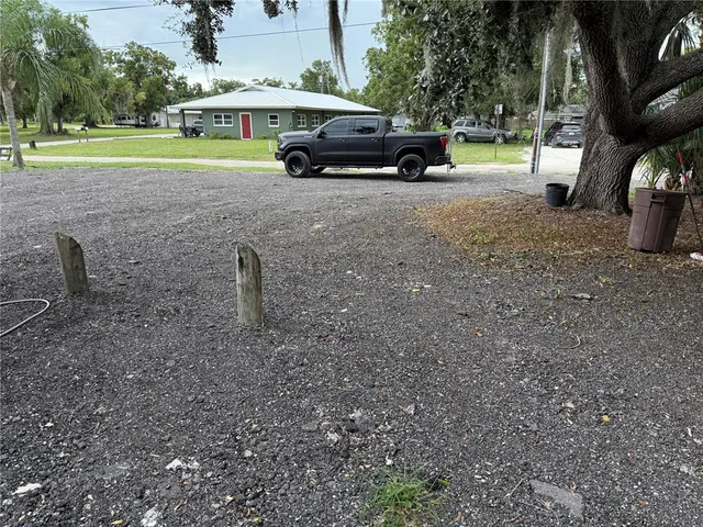 a view of a car parked in front of a house