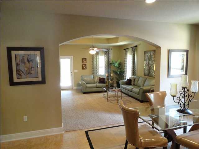 453 Pin Oak Loop Santa Rosa Beach, FL 32459 - Photo 2 of 14 a living room with furniture and wooden floor