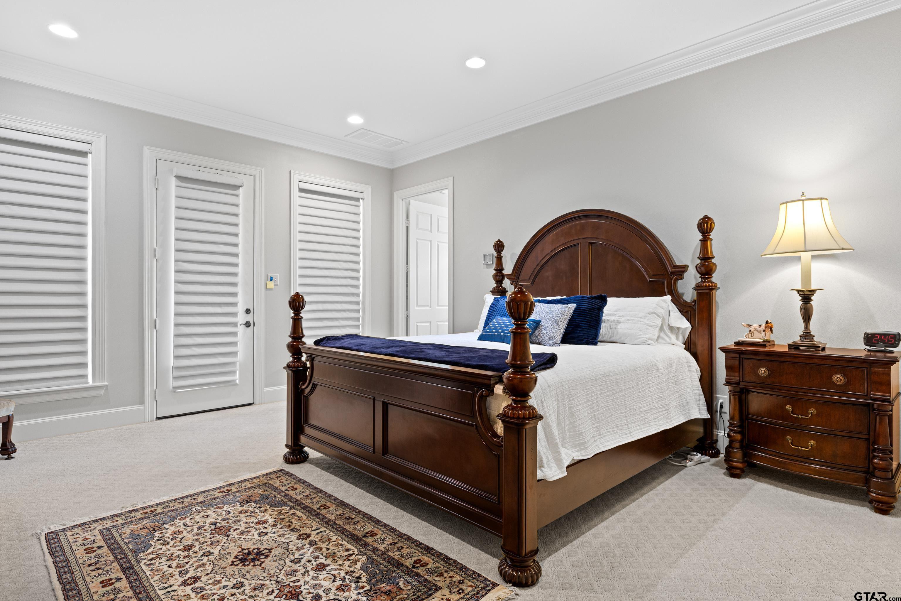 1360 East Main Street Henderson, TX 75652 - Photo 25 of 48 a bedroom with a bed and a window