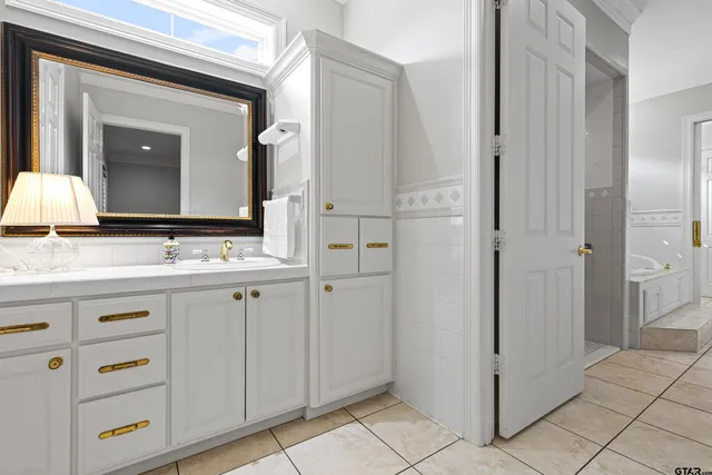 a view of a kitchen with furniture and wooden floor