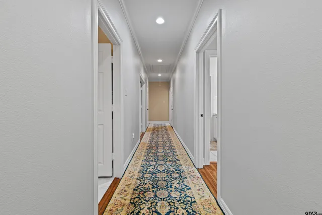 a view of hallway with walk in closet