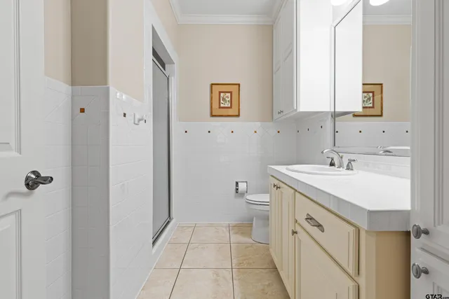 a kitchen with a sink and a refrigerator