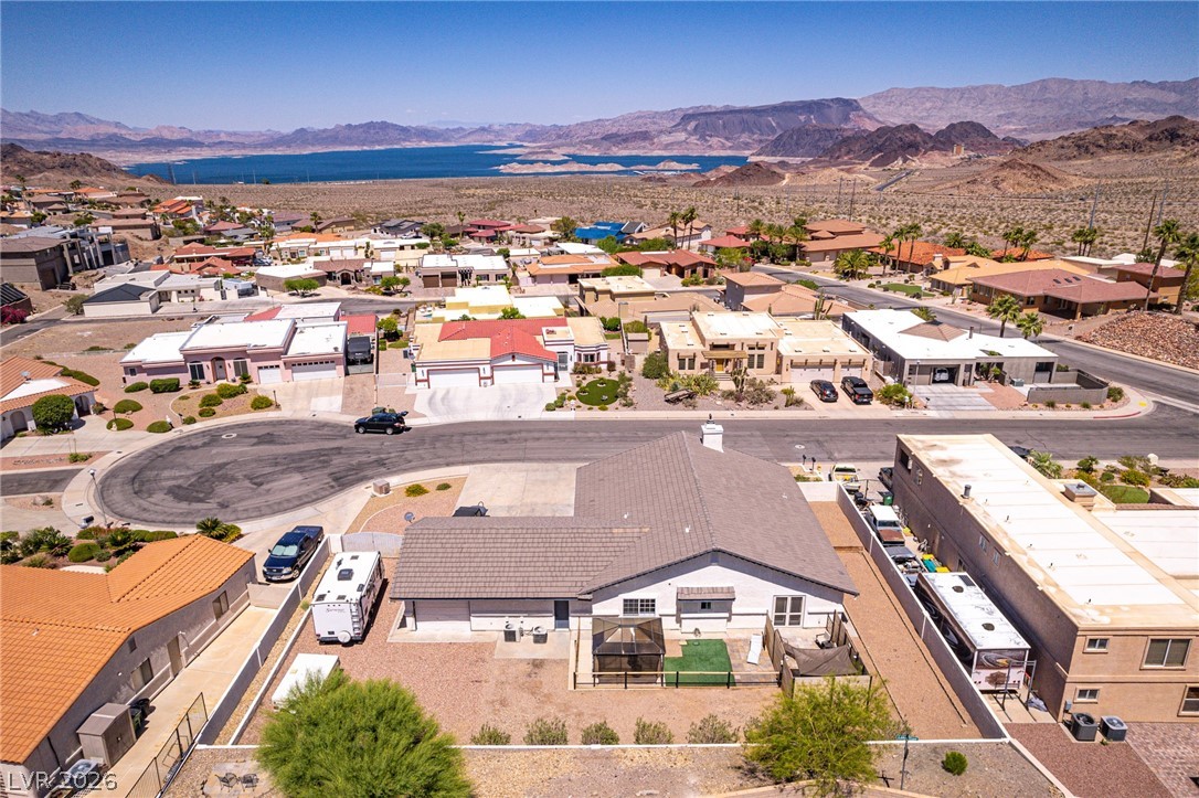 524 Swallow Cove Boulder City, NV 89005 - Photo 2 of 58 Perched above a scenic lake, this residence offers captivating mountain and water views.