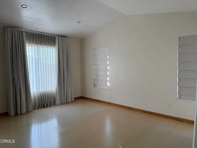 an empty room with windows