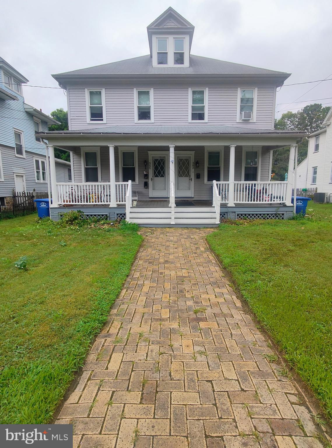 343 West 2nd Street Moorestown, NJ 08057 - Photo 1 of 31 a front view of a brick building with a garden