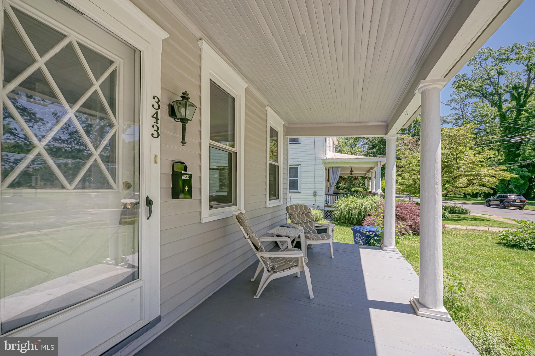 343 West 2nd Street Moorestown, NJ 08057 - Photo 2 of 31 a patio with yard glass top table and chairs