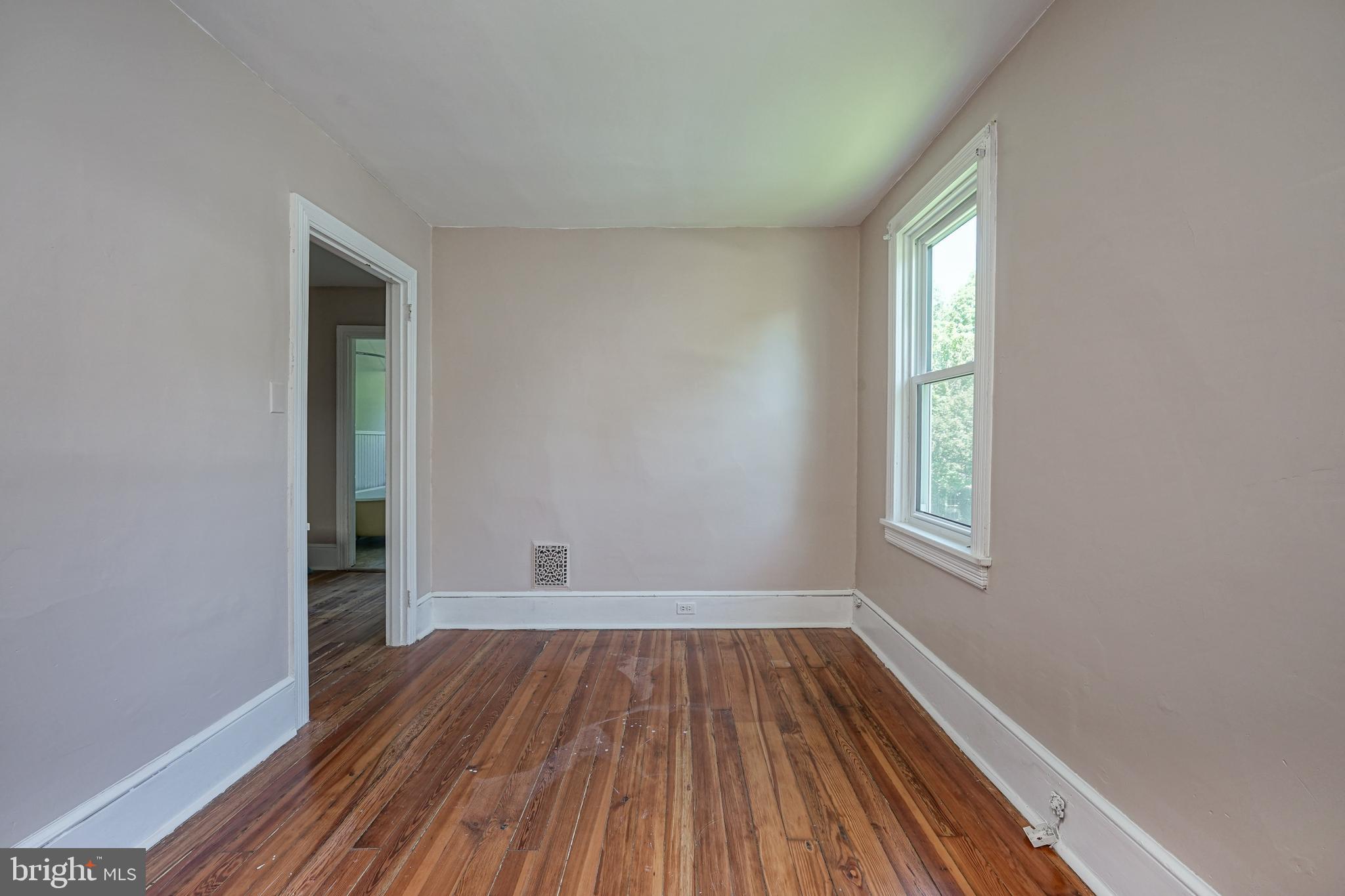 343 West 2nd Street Moorestown, NJ 08057 - Photo 21 of 31 an empty room with wooden floor and windows