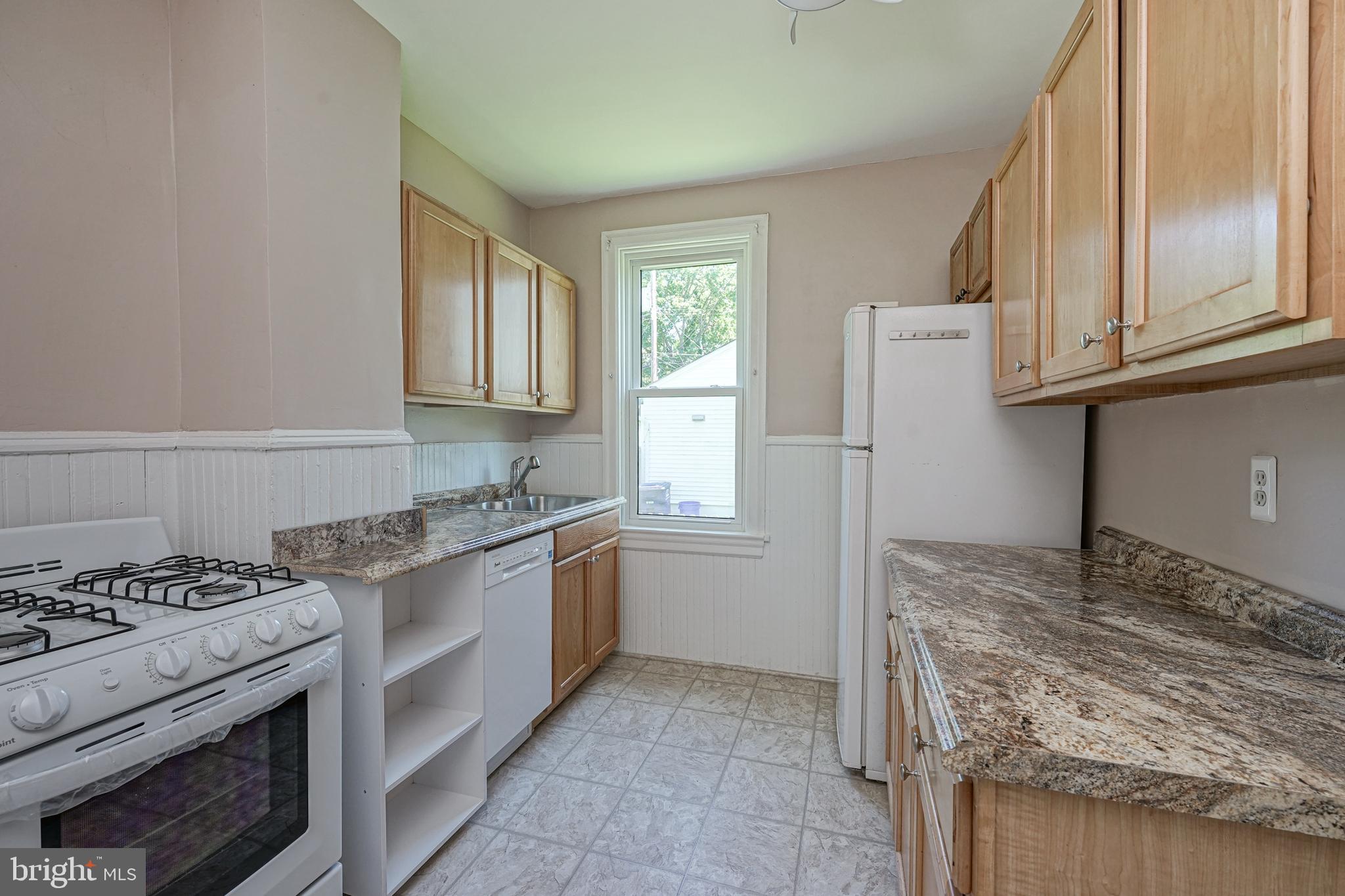 343 West 2nd Street Moorestown, NJ 08057 - Photo 10 of 31 a kitchen with a stove and a refrigerator