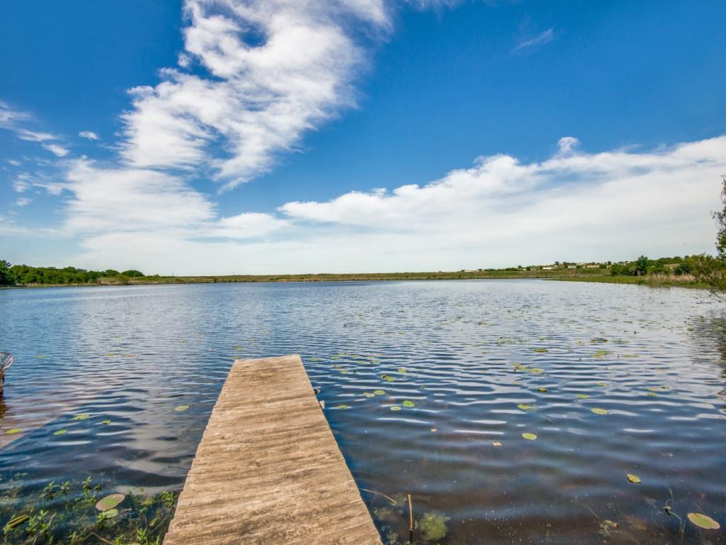 a view of a lake from a terrace