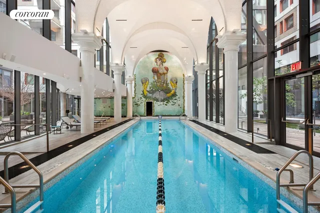 a view of a balcony with swimming pool