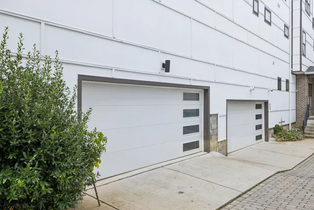 a view of a house with a garage