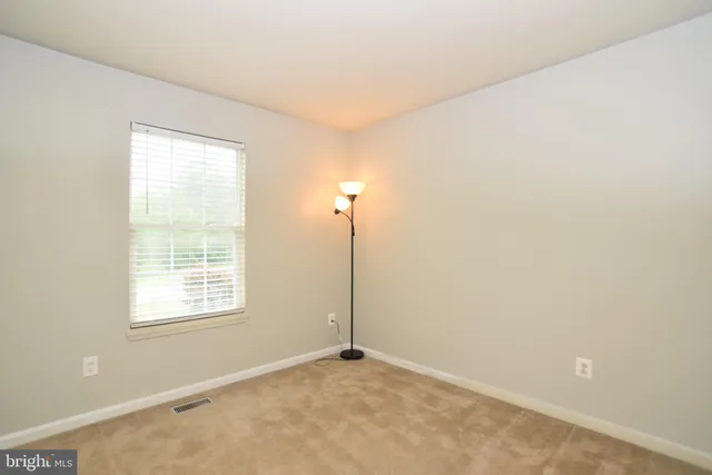 a view of an empty room with window