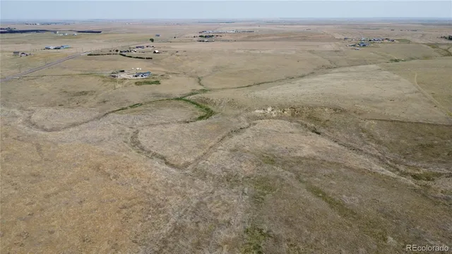 an aerial view of beach and space
