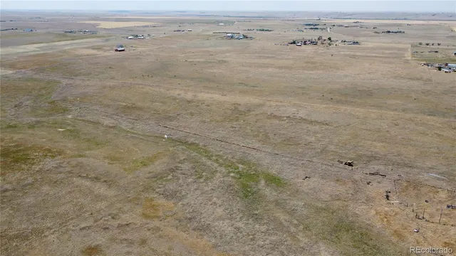 a view of a lake from a yard