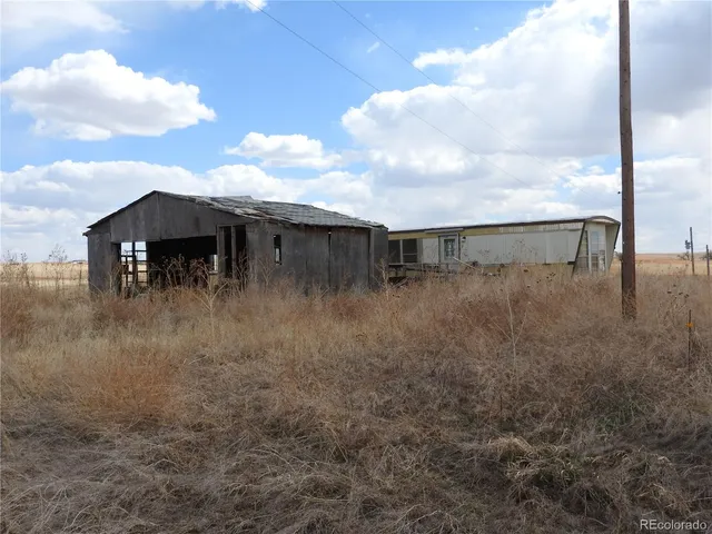 a view of a house with a deck
