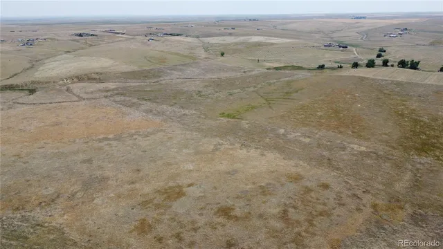 an aerial view of beach with beach