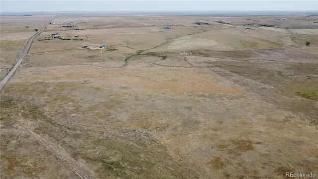 a view of beach and an ocean