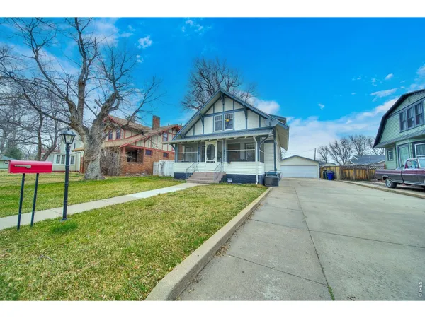 a house view with a garden space