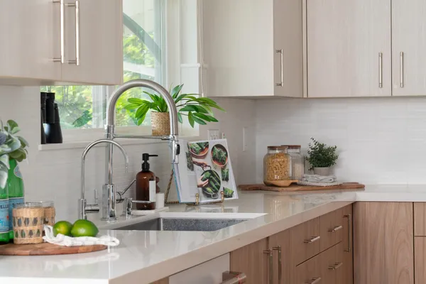 a kitchen with sink and window
