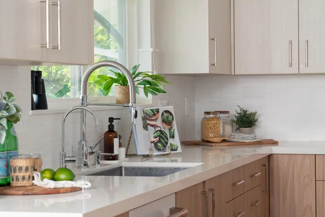 a kitchen with sink and window