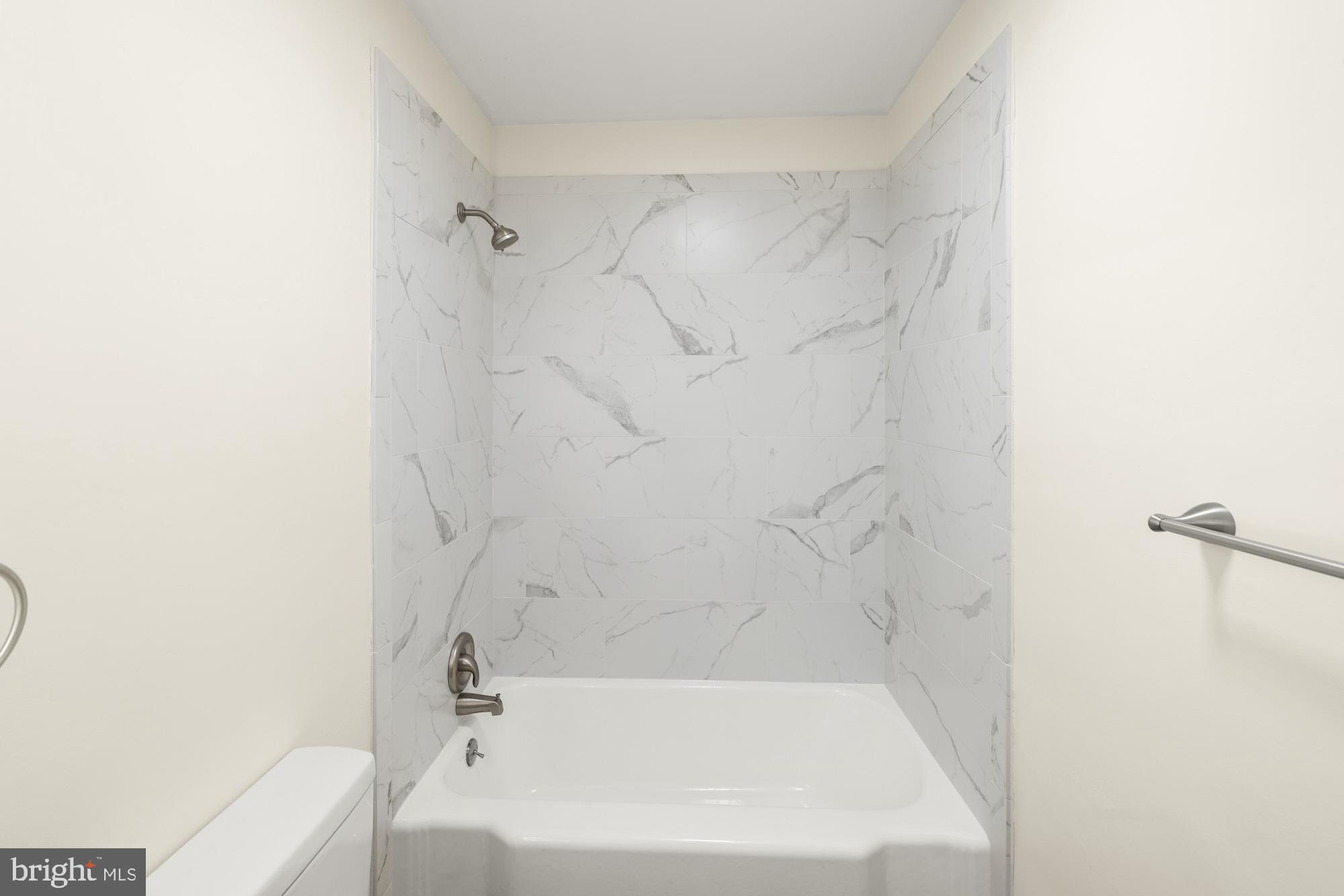 2315 Table Rock Road Biglerville, PA 17307 - Photo 22 of 39 a white bath tub sitting next to a white toilet