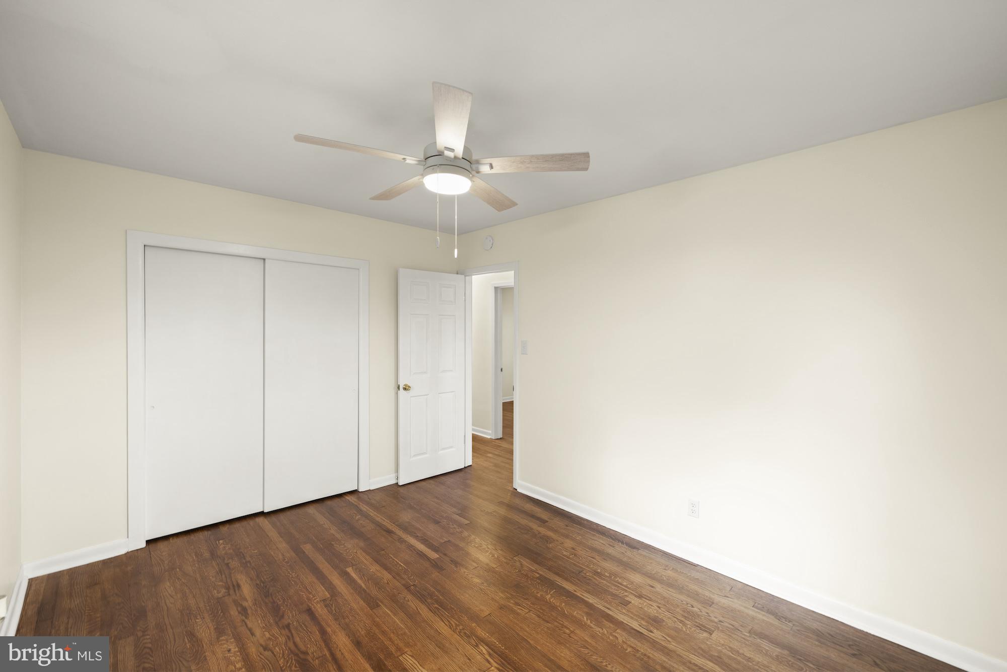 2315 Table Rock Road Biglerville, PA 17307 - Photo 29 of 39 an empty room with wooden floor and ceiling fan