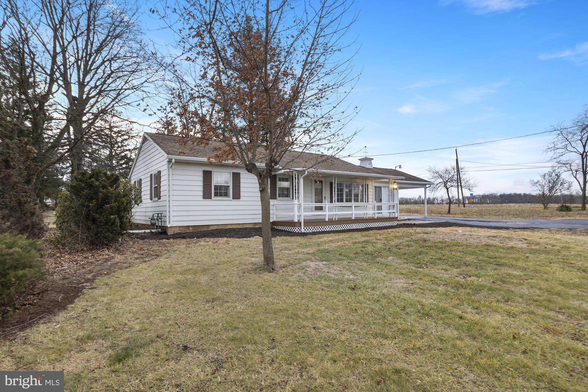 2315 Table Rock Road Biglerville, PA 17307 - Photo 3 of 39 a house with trees in the background