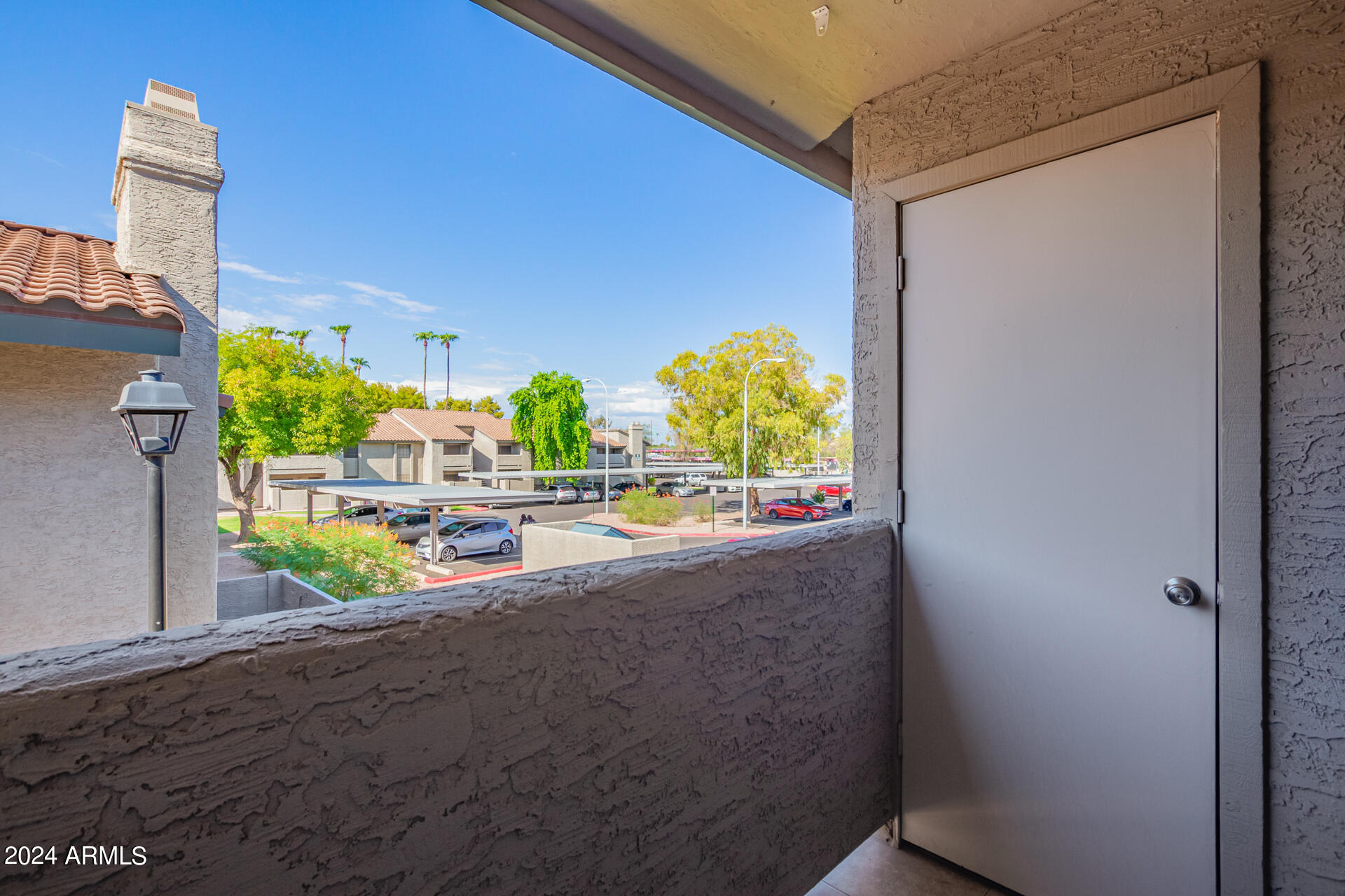 533 West Guadalupe Road, Unit 2046 Mesa, AZ 85210 - Photo 22 of 29 a view of a balcony and window