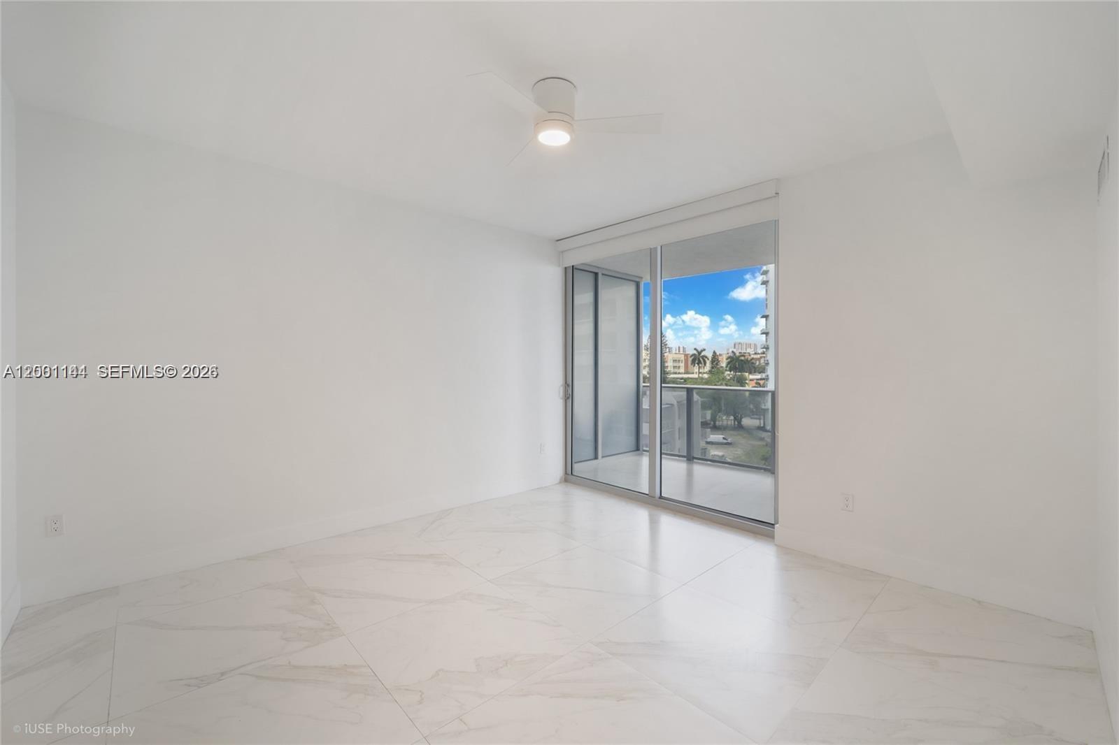 488 Northeast 18th Street, Unit 505 Miami, FL 33132 - Photo 5 of 12 a view of an empty room and window