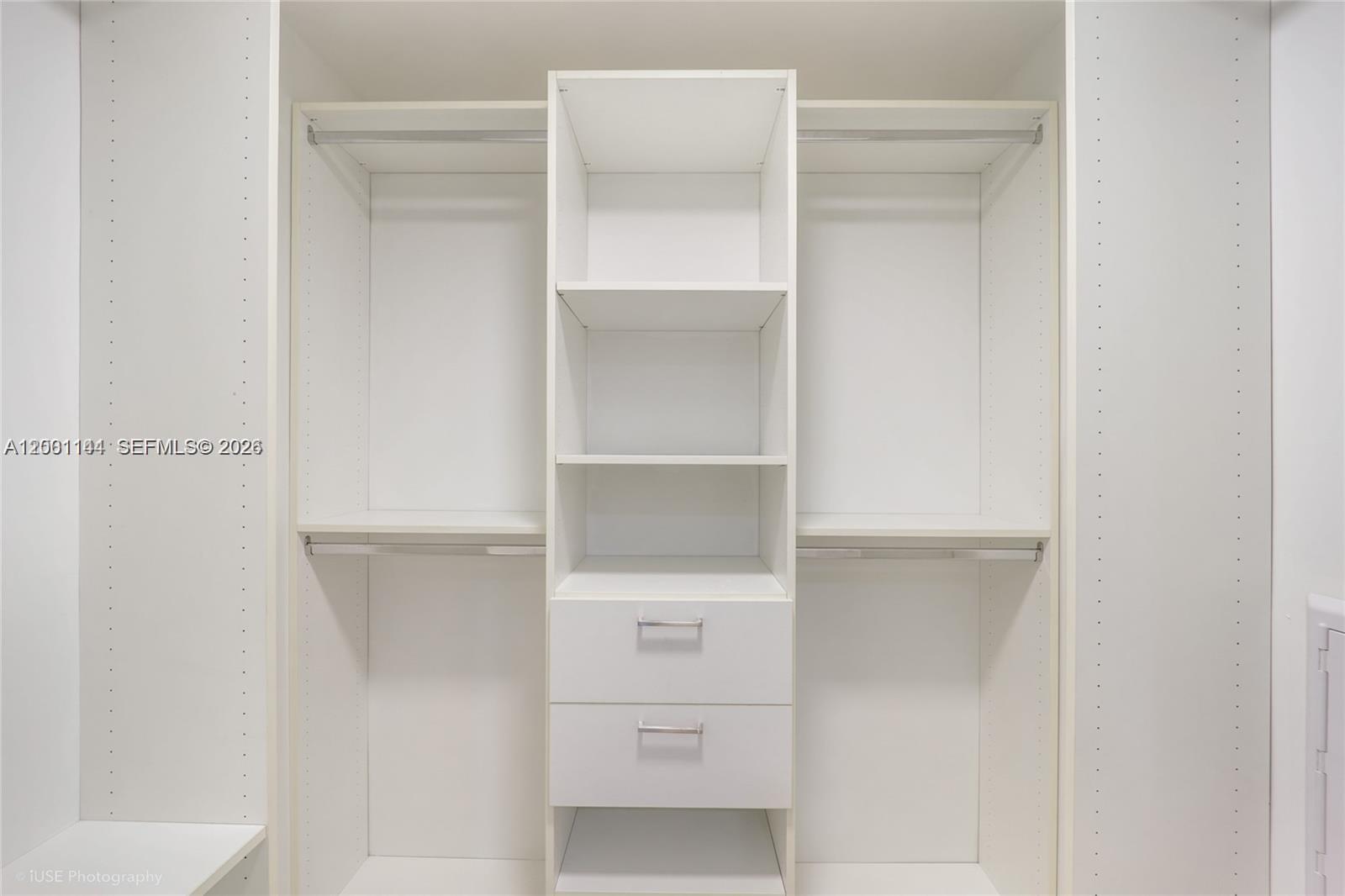 488 Northeast 18th Street, Unit 505 Miami, FL 33132 - Photo 10 of 12 a view of an empty walk in closet