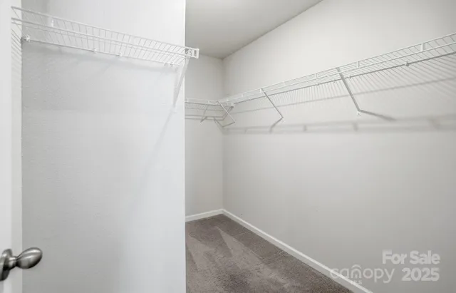 a view of a room with racks on the wall